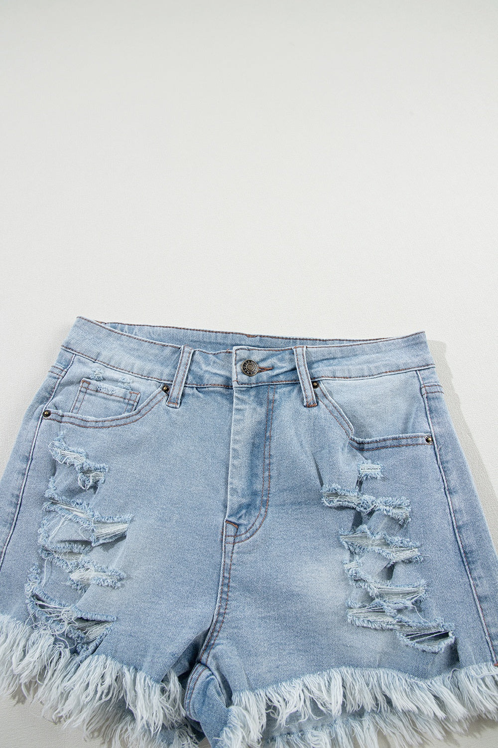 Distressed Light Denim Shorts